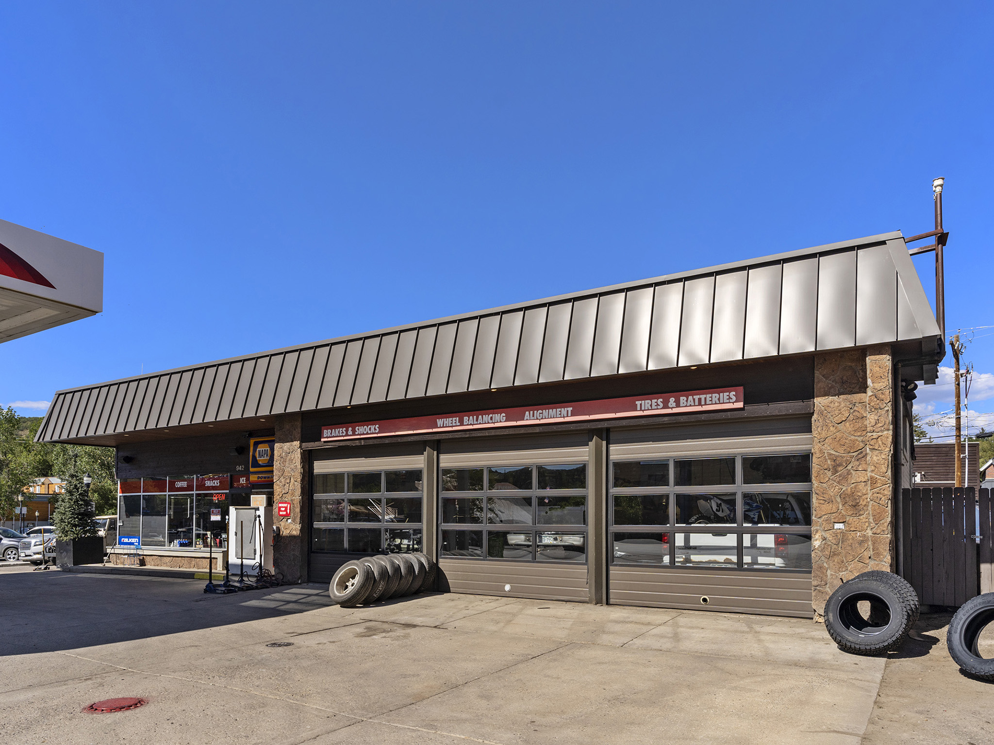 Downtown Conoco aerial view with mountains